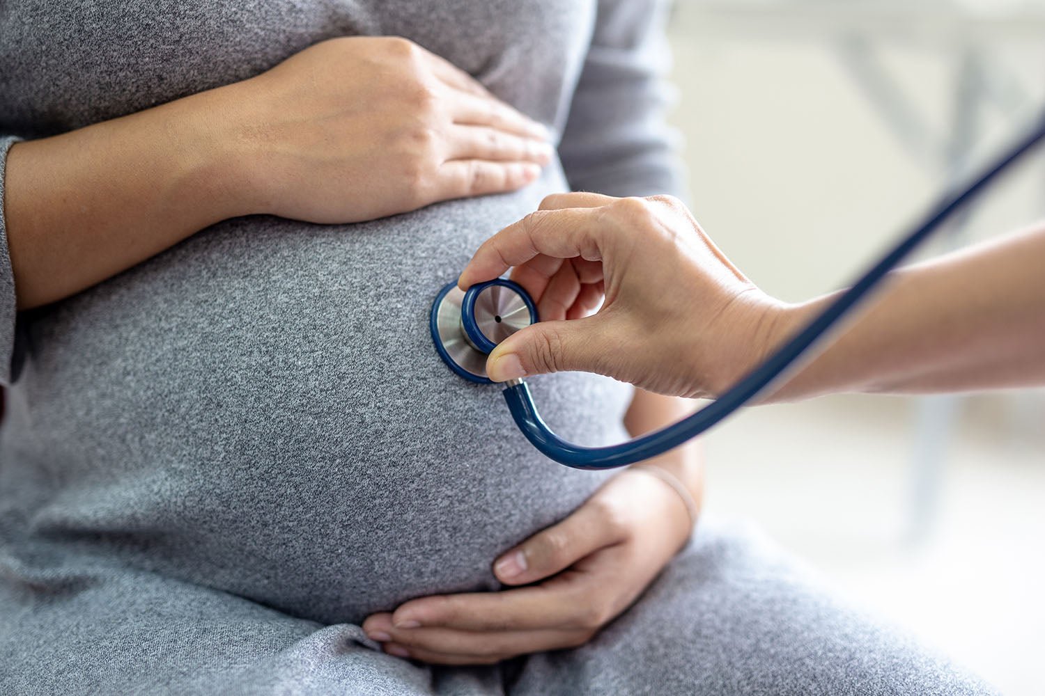 Pregnant woman at doctor's office for checkup - The PUPPP Cleanse